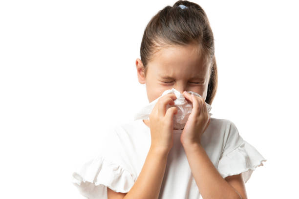 istock Little Girl Cleaning Her Nose 1298688764