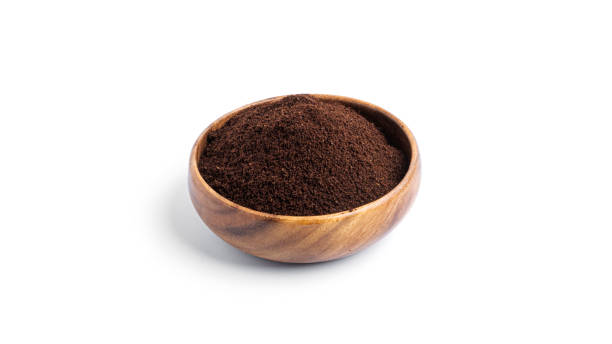 istock Coffee in wooden bowl isolated on a white background 1298689228