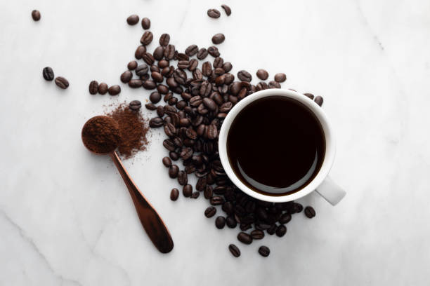 chicchi di caffè - coffee crop bean seed directly above foto e immagini stock