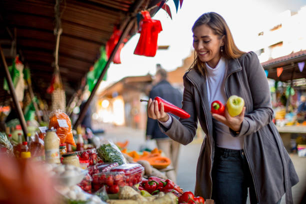 istock Woman is buying peppers for lunch. 1298691432