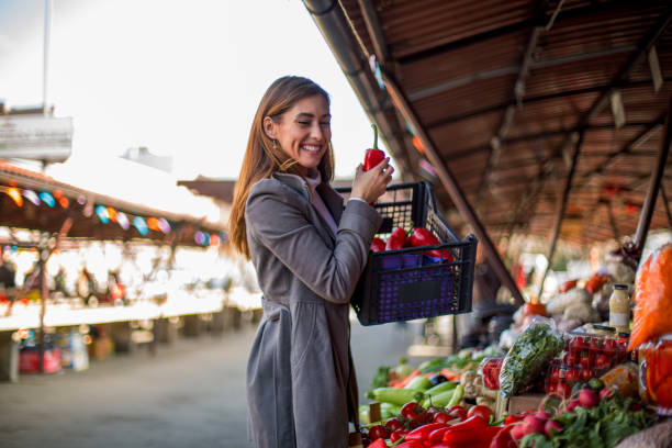 istock Woman choosing fresh vegetables. 1298691436