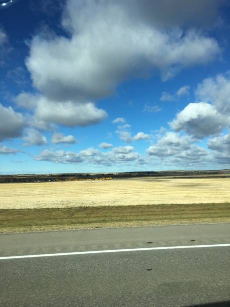 istock Cloudscape over the prairie grasslands stock photo 1298693353