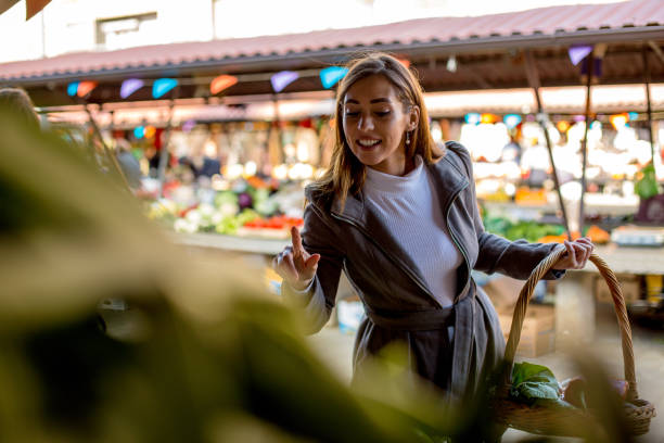 istock Shopping most fresh vegetables from stand. 1298694200