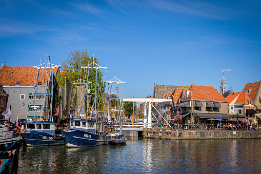Ships in the historic Binnehaven (Inner Harbor/Port), Hoorn, North Holland, Netherlands, People sitting outside a Restaurant/bar