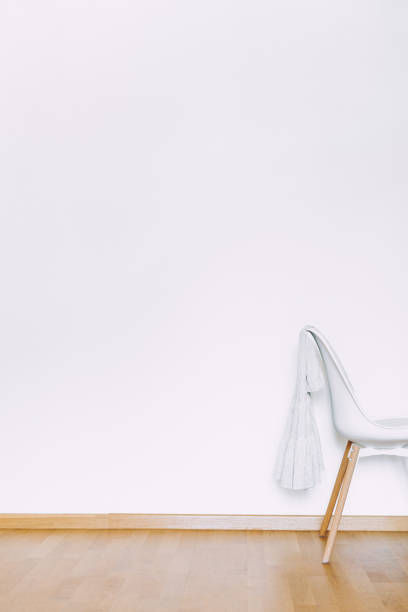 istock Indoors flat wall mockup with Clothes on Chair 1298694693