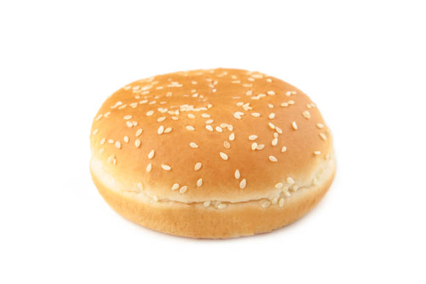 istock Burger bun isolated on a white background. 1298696234