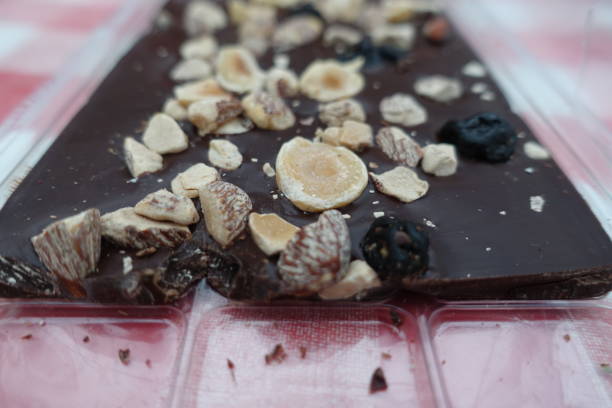istock Dark chocolate with hazelnuts, almonds and blueberries 1298703892
