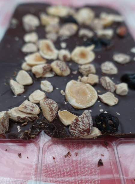 istock Dark chocolate with hazelnuts, almonds and blueberries 1298703924