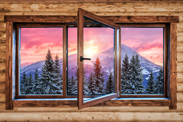An old square wooden rural window frame