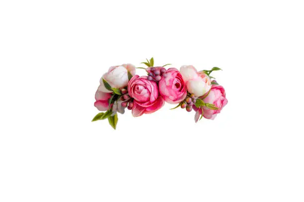 pink flower wreath of artificial roses isolated on white background. Copy space