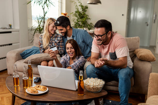 istock Friends shopping online 1298715551