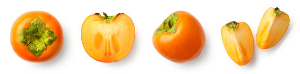 istock Fresh whole, half and sliced persimmon fruit isolated on white background 1298717516