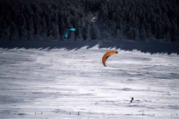 istock snowkiting on a snow field 1298719646