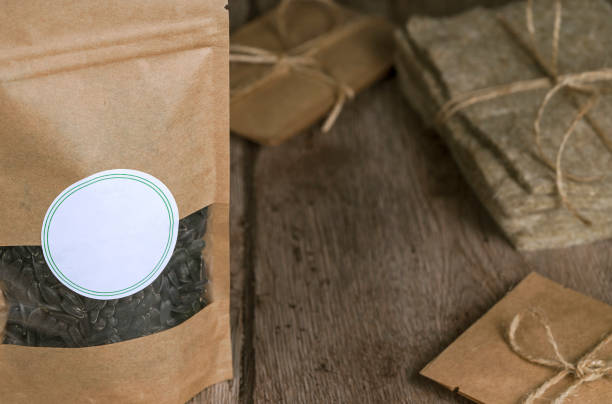 istock Sunflower seeds in the paper bag 1298722402