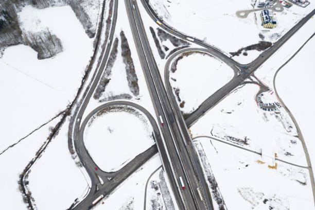 istock Aerial View of a Highway Interchange in Winter 1298728486