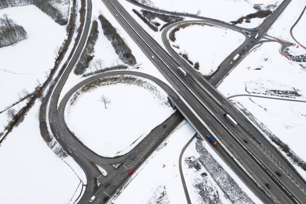 istock Winter Highway Interchange, Aerial View 1298728723