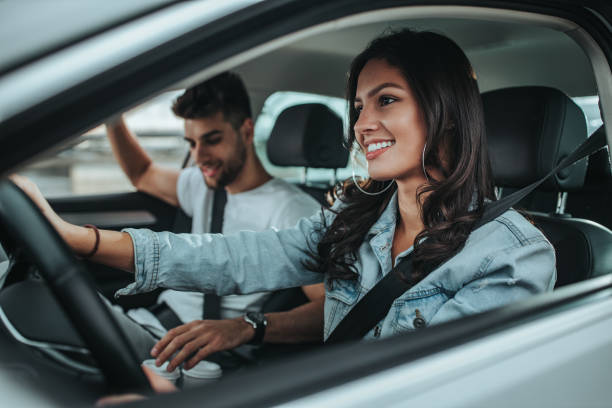 istock Young happy couple going on a road trip by car 1298730068