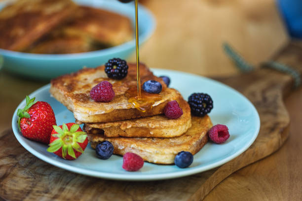 istock French Toast with Berries and Maple Syrup 1298733910