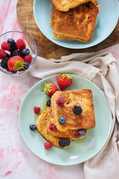 istock French Toast with Berries and Maple Syrup 1298734148