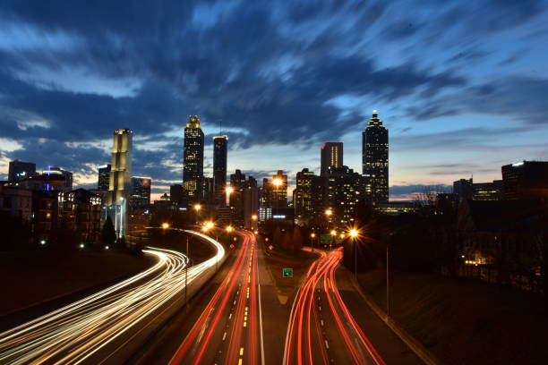 istock Downtown Atlanta skyline & traffic during sunset 1298734845