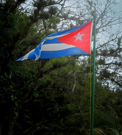 Cuban flag at La Cueva de Portales near  San Diego de los Banos, Cuba which is where Che Guevara camped while aiding Fidel Castro during the Cuban revolution in 1962