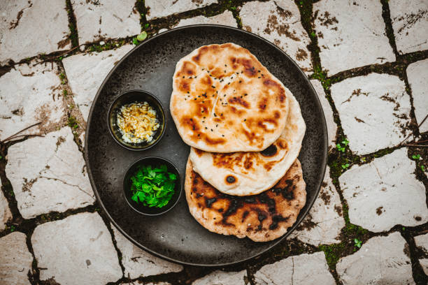 istock Traditional Indian Naan Flatbread 1298748777