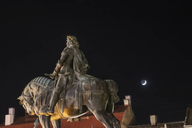 istock Statue of King Matia Corvinus during night time with copy space 1298752508