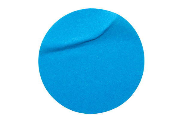 istock Blank blue round adhesive paper sticker label isolated on white background 1298757532