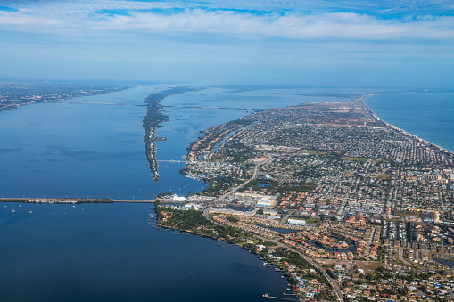 Aerial view of the Indian River, southern tip of Merrit Island, and the Atlantic Ocean from an aircraft departing Melbourne, Florida. The Eau Gallie and Pineda Causeways are visible. (Photo taken on January 17, 2021)