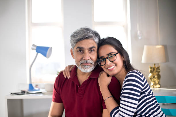 istock Loving father and daughter at home 1298772969