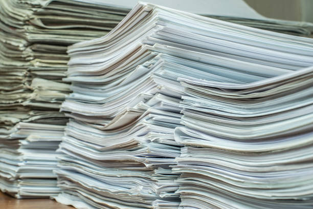 istock pile of paper documents in the office 1298786547