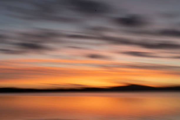 istock Golden hour morning light over Waimapu Estuary bay motion blur abstract. 1298789599