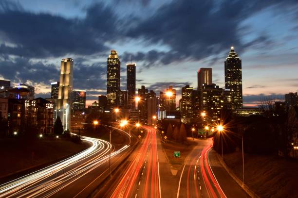 istock Downtown Atlanta skyline & traffic during sunset 1298791487
