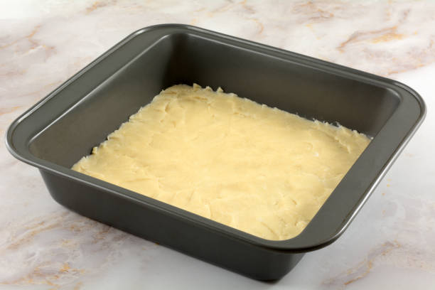 istock Raw dough for crust for dessert bars 1298795342