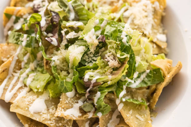 istock Mexican Vegan Caesar Salad with Tortilla Chips 1298809793