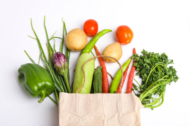 istock Healthy food concept. Vegetables collection isolated over white background. 1298809982