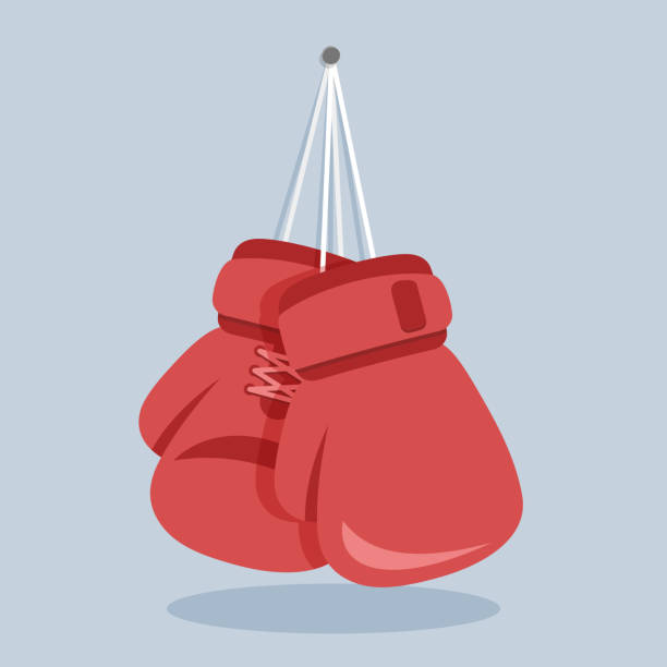 боксерские перчатки висят на гвозде в стене. простая векторная иллюстрация в плоском дизайне - boxing glove sports glove hanging combative sport stock illustrations