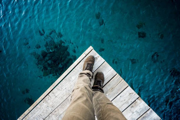 feet of guy looking down at water on pier, vans, dock, lake tahoe, tahoe