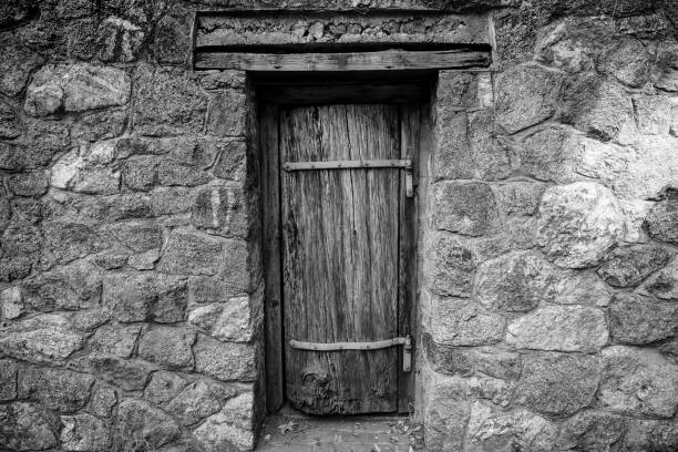 istock black and white old wooden door 1298822141