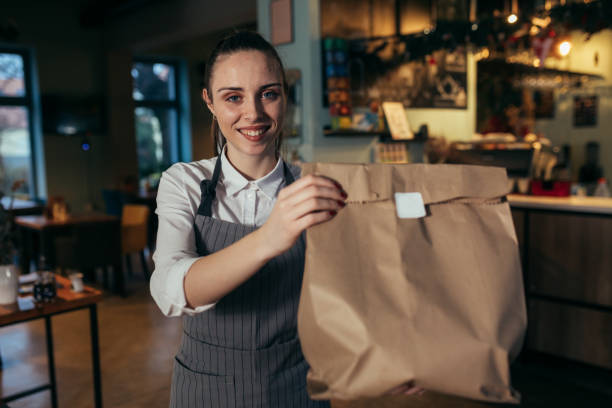 istock waitress in cafe or restaurant 1298824857