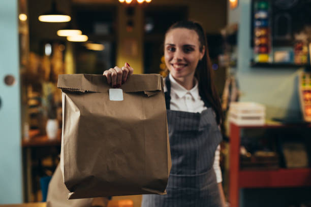 istock waitress preparing take away food in restaurant 1298828539