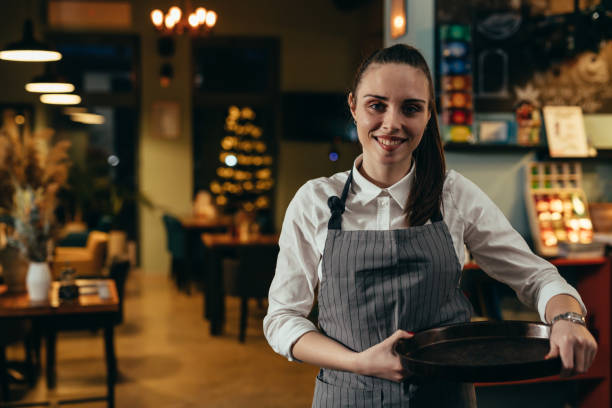 istock waitress posing in restaurant or cafe 1298830029