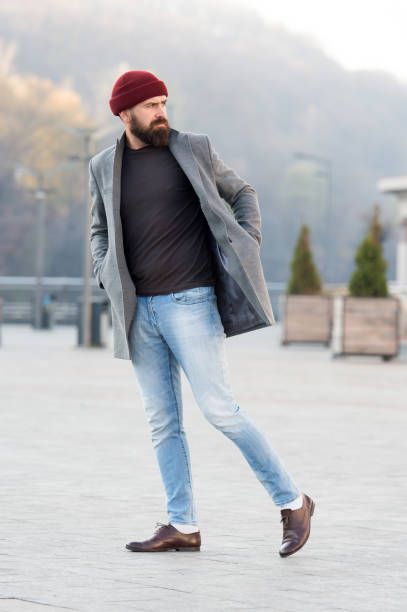 Refreshing walk. Hipster outfit and hat accessory. Stylish casual outfit spring season. Menswear and male fashion concept. Man bearded hipster stylish fashionable coat and hat. Comfortable outfit Refreshing walk. Hipster outfit and hat accessory. Stylish casual outfit spring season. Menswear and male fashion concept. Man bearded hipster stylish fashionable coat and hat. Comfortable outfit. men fashion model stubble serious stock pictures, royalty-free photos & images