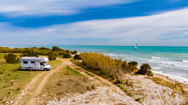 istock Caravan camping on coast. Aerial view 1298832689