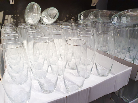 glass vases on shelf in store. Interior decor store