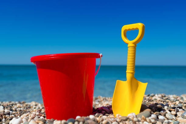 Beach toys in the sand by the sea on a caribbean island