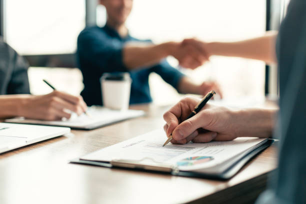 istock close up. business team is working on a new financial project 1298839865