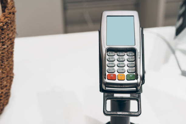 istock Credit card payment terminal in a shop 1298846206