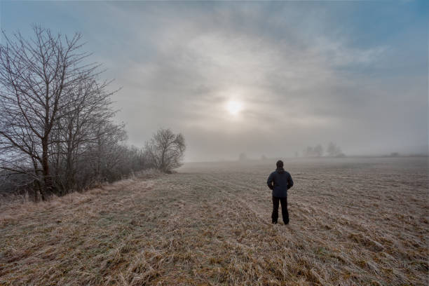istock men silhouette in the fog 1298849550