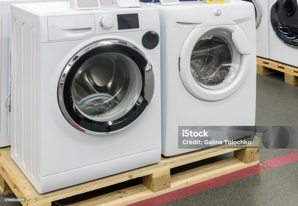 Washing machines modern washing machine. Machinery Stock Photo